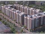 The image is an aerial view of a residential complex. The complex is made up of multiple high-rise buildings with multiple fl...
