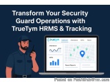 The image shows a man in a blue uniform holding a walkie-talkie and standing in front of a laptop. On the laptop screen, ther...