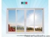 The image shows a window with a white frame and glass panels. The window is open, allowing natural light to enter the room. T...