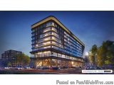 The image is a digital rendering of a modern apartment building at night. The building is a two-story structure with a flat r...