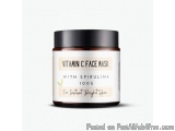 The image is of a jar of Vitamin C face mask with Spirulina 100g. The jar is black with a white label that reads "Vitamin C F...