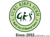 The image is a circular logo of Guru Kirpa Sukh, a health care and research centre. The logo is circular in shape and has a g...