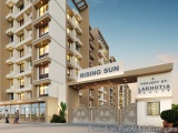 The image is a 3D rendering of a modern apartment building named Rising Sun. The building is a two-storey structure with a fl...