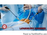 The image shows a group of surgeons performing laparoscopic surgery in an operating room. The surgeons are wearing white surg...