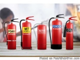 The image shows four fire extinguishers of different sizes and colors - foam, wet chemical, water, powder, and CO2. The foam...