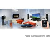 The image shows a modern living room with a large flat-screen TV mounted on the wall. The TV is turned on and there are sever...