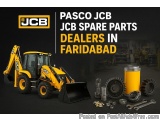 The image shows a yellow JCB backhoe loader with various spare parts scattered around it. The background is black and there i...