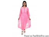 The image shows a young woman wearing a pink kurta with a floral print. The dress is long and flowy, with a high neckline and...