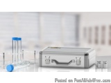 The image shows a laboratory equipment set up on a white surface. On the left side of the image, there are three test tubes w...