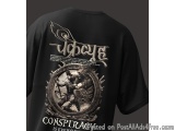 The image is a black t-shirt with a graphic design on the back. The design features a circular emblem with a dragon in the ce...