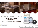 The image shows a kitchen countertop with a granite polishing system. The countertop is made of dark brown granite and has a...