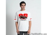 The image is of a young man wearing a white t-shirt with a graphic design on the front. The design features a red car with th...