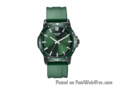 The image is of a wristwatch from the brand POCE. The watch has a round, green dial with white hour markers and hands. The br...
