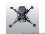 The image shows a black drone frame with four legs and a camera attached to it. The frame is made of metal and has a sleek, m...