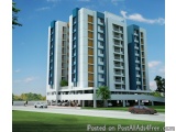 The image is a 3D rendering of a modern apartment building. The building is tall and has multiple floors, with balconies on e...