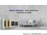 The image shows a modern living room with a gray sofa and a white coffee table in the center. On the left side of the image,...