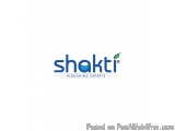 The image is a logo for a company called Shakti Ploughing Experts. The logo is written in a modern, sans-serif font and is in...