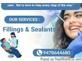 The image is an advertisement for a dental clinic called Fillings & Sealants. The background is white and the text is in blue...
