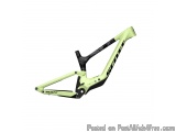 The image is of a Scott Genius RC 900 mountain bike frame. The frame is predominantly green in color with black accents. It h...