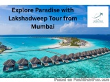 The image is an aerial view of a beautiful tropical resort in the Maldives. The resort is located in the middle of the ocean...