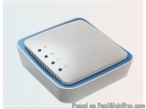 The image shows a white rectangular device with a blue border around the edges. The device appears to be a wireless router or...