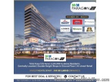 The image is an advertisement for M&M Paragon 57, a luxury hotel in India. The advertisement features a modern building with...