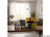 The image shows a wooden table in a living room with a window in the background. On the table, there are various decorative i...