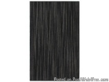 The image is a black rectangular panel with vertical lines running horizontally across it. The lines are evenly spaced and ap...