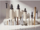 The image shows a collection of different types of perfume bottles and tubes arranged on a white surface. There are six bottl...