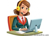 The image shows a young woman sitting at a desk with a laptop in front of her. She is wearing a red blazer, a white shirt, an...