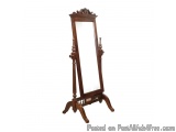 The image shows a wooden floor-standing mirror with a tall, rectangular frame. The frame is made of dark wood and has intrica...