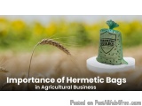 The image shows a green hermetic bag with the words "Greenguard" written on it, placed on a white pedestal in a field of yell...
