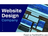 The image shows a desk with a computer monitor, keyboard, mouse, and two mobile phones on it. The monitor displays a website...
