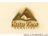 The image is a logo for a company called Hatu View Homestay. The logo is in the shape of a triangle with a house in the cente...