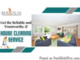 The image is an advertisement for a house cleaning service called "MADS.IN". The background of the image is a modern living r...