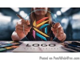 The image shows a person's hands holding a colorful logo with the text "Logo Acug-Deaiors" written on it. The logo is made up...
