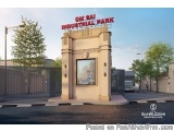 The image is a 3D rendering of a small, beige-colored building with a red sign that reads "OM-SAL Industrial Park" above it....
