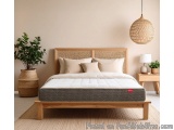 The image shows a modern bedroom with a wooden bed in the center. The bed has a wooden frame with a woven headboard and footb...