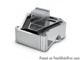 The image shows a 3D rendering of a metallic object, which appears to be a part of a machine or machinery. It is made of meta...