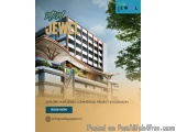 The image is an advertisement for a commercial project in Gurgaon, India. The background of the image is a modern building wi...