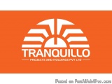 The image is a logo for Tranquillo Projects and Holdings Pvt Ltd. The logo is a circular design with a white background and o...