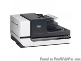 The image shows an HP LaserJet Enterprise Flow MFP (Integrated Printer) model. It is a large, rectangular printer with a blac...