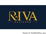 The image is a logo for a company called RIVA Designer. The logo is written in a modern, sans-serif font with the letters "RI...