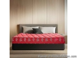 The image shows a modern bedroom with a large bed in the center. The bed has a gray headboard and a red mattress with a flora...