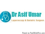 The image is a logo for Dr Asif Umar, a medical professional. The logo is a blue circle with a white stethoscope icon in the...