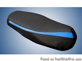 The image shows a black and blue motorcycle seat cover. The cover is made of a soft, padded material and has a textured surfa...
