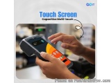 The image shows a person's hand holding a touch screen device. The device is black in color and has a rectangular shape. The...