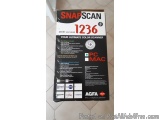 The image is of a product packaging for a SnapScan 1236 color scanner. The packaging is black and white in color and has the...