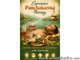 The image is an advertisement for a Panchakarma Therapy program. It features a man lying on a massage table with his eyes clo...