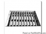 The image shows a rectangular metal tray with multiple rows of small, cylindrical tubes arranged in a grid-like pattern. The...